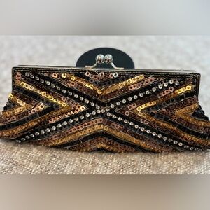 Aldo Multicolor Metallic Sequin Clutch.